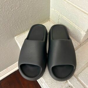 Yezzy Adidas slides. Comes with box. Excellent condition. We need to size down